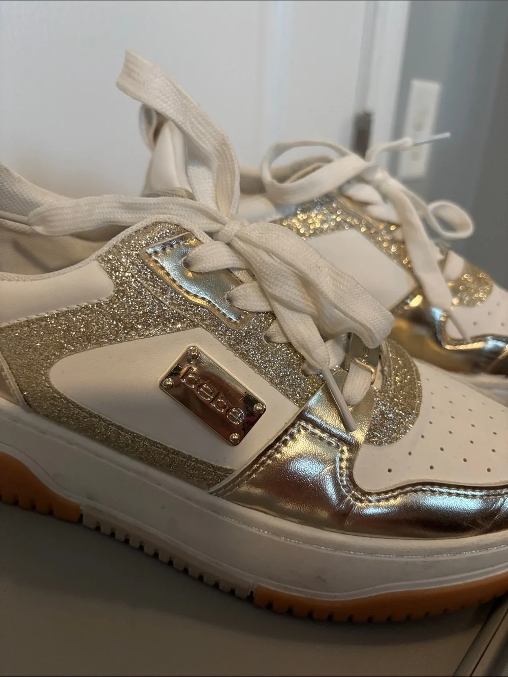 bebe White and Metallic Gold Platform Sneakers